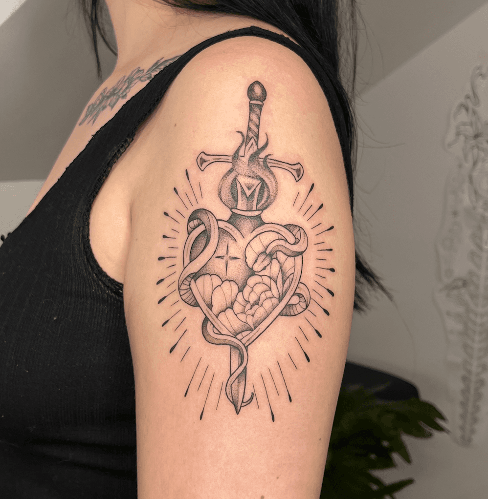 Fine-line snake and cherry blossom back tattoo with red accents by AinsleyXTattoos